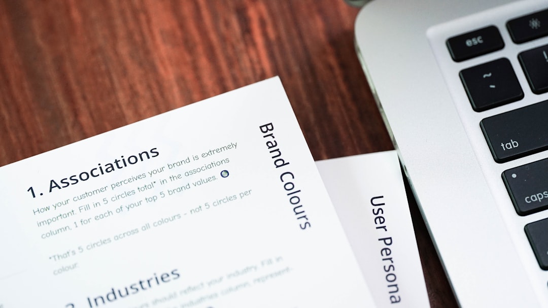 a-close-up-of-a-keyboard-and-a-paper-y8fpsylb7zy